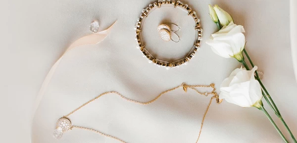 Jewellery with ribbon and rose